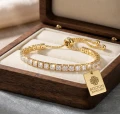 ZLOTA-BRANSOLETKA-DAMSKA-Z-CYRKONIAMI-TENISOWA-REGULOWANA-KRYSZTAŁY-18K-NA-PREZENT-BOSTON-JEWELLERY-1.png